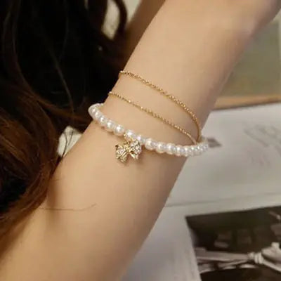 🎀: Korean Style Multi-Layer Pearl Bracelet with Bow - Feminine Fashion Jewelry