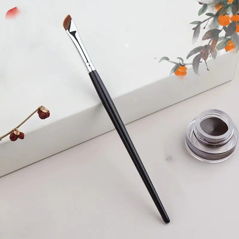 🖌️: Angled Sickle Edge Makeup Brush - Precision Professional Beauty Tool