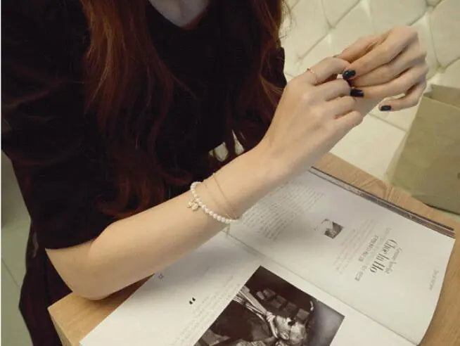 🎀: Korean Style Multi-Layer Pearl Bracelet with Bow - Feminine Fashion Jewelry